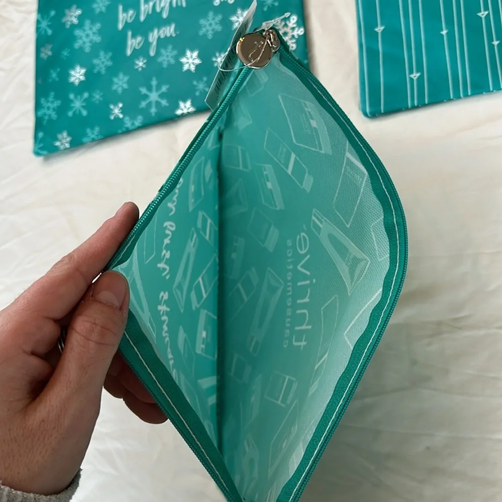 NEW WITH TAGS! A Trio Of Teal Makeup Pouches With Inspirational Quotes On Them.